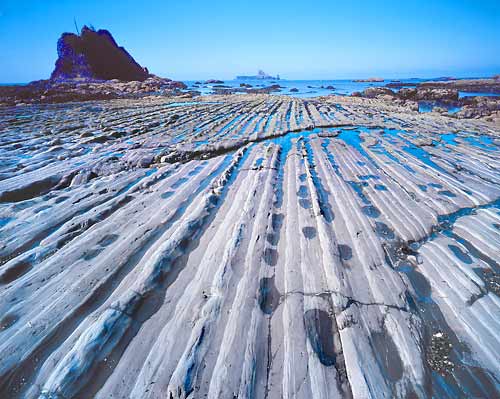 low tide and sandstone strata 